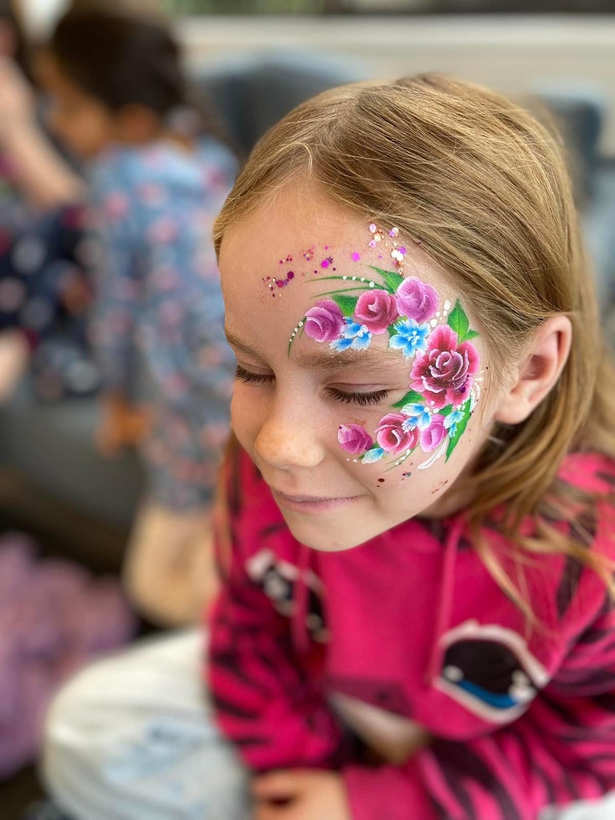Detailed mask design — Little Smiles face painting at Auckland birthday